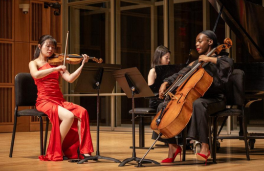 Musicians perform in Mixon Hall. 